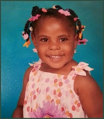 Happy African American girl with pigtails