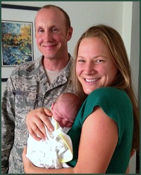 Adoptive parents Eric and Michelle with their newborn baby boy