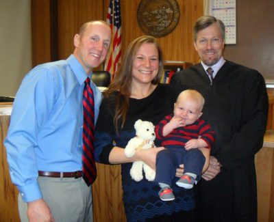 California adoptive couple at son's adoption finalization