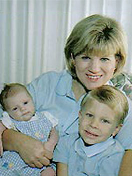 Adoptive mom and her two children pose for a photo