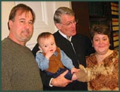 Phil, Linda, their son, and judge at adoption finalization
