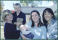Lifetime family coordinators with adoptive mom and son