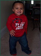 Toddler with red money shirt