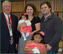 Chris and Holly with judge and adopted daughters