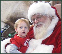 Blond little boy with Santa