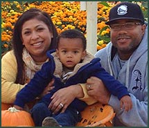 Michael and Rosemary at a pumpkin patch with their adopted, animated son
