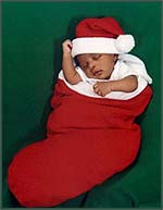 baby in Christmas stocking