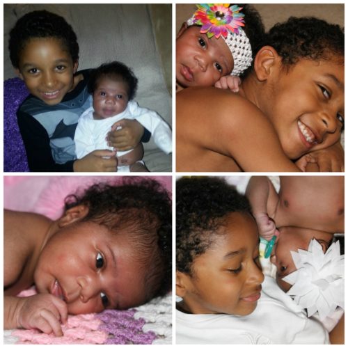 African American boy with his baby sister