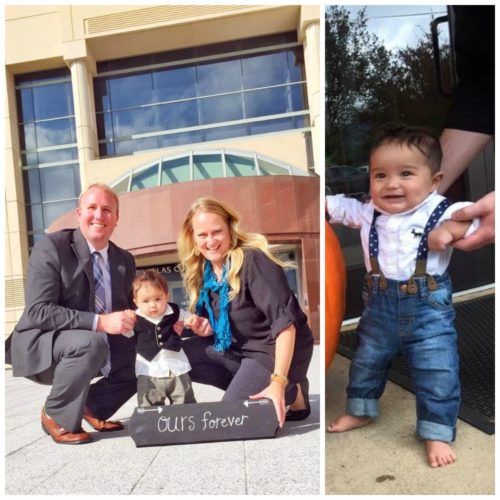 Adoptive couple with new child in front of courthouse with sign that reads Ours Forever