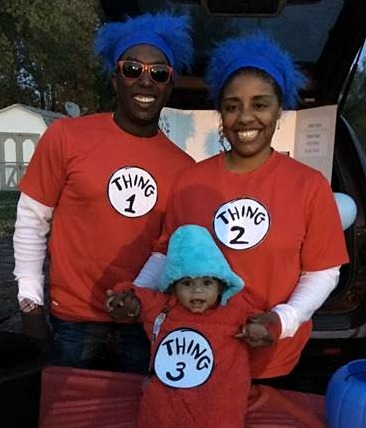 African American family dressed as Things 1, 2 and 3