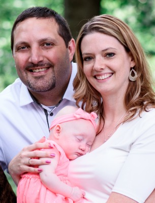 Happy adoptive parents Frank and Lisa with their newborn baby girl