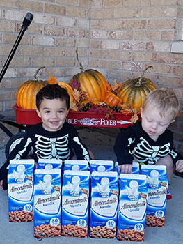 two young boys dressed as skeletons for Halloween