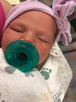 Adoptive parents Justin and Jennifer's newborn baby girl