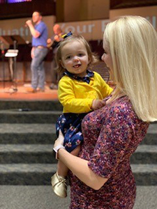 Adoptive mom Jeanna at church with her adopted daughter