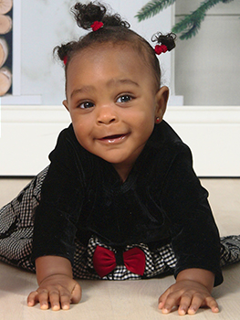 baby girl dressed up for Christmas