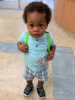 young child with his backpack