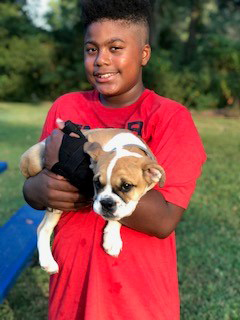 our adopted son and his new puppy