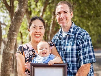 Thanks adoptive parents with their newly adopted baby