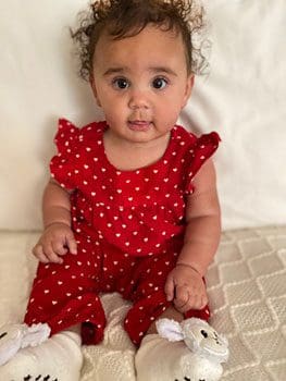 our daughter in red polka dots
