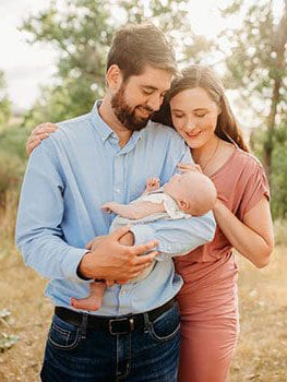 family photo with Dad holding baby