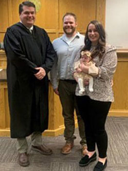 adoption finalization day photo with the judge