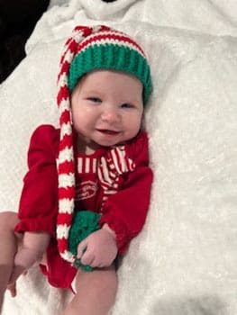 precious smile on baby's first Christmas