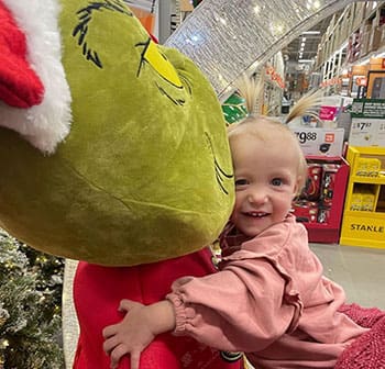 Carson hugging the Grinch 
