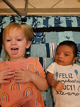 family smiling after successful adoption