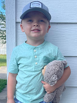 Adopted boy with bear