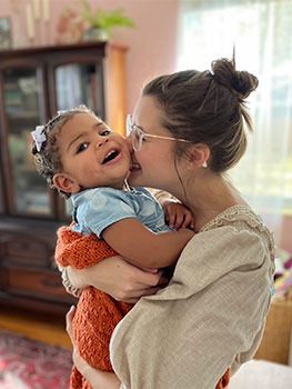 adoptive mom feeling blessed with her newly adopted daughter